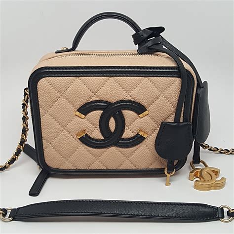 chanel beige and black bag